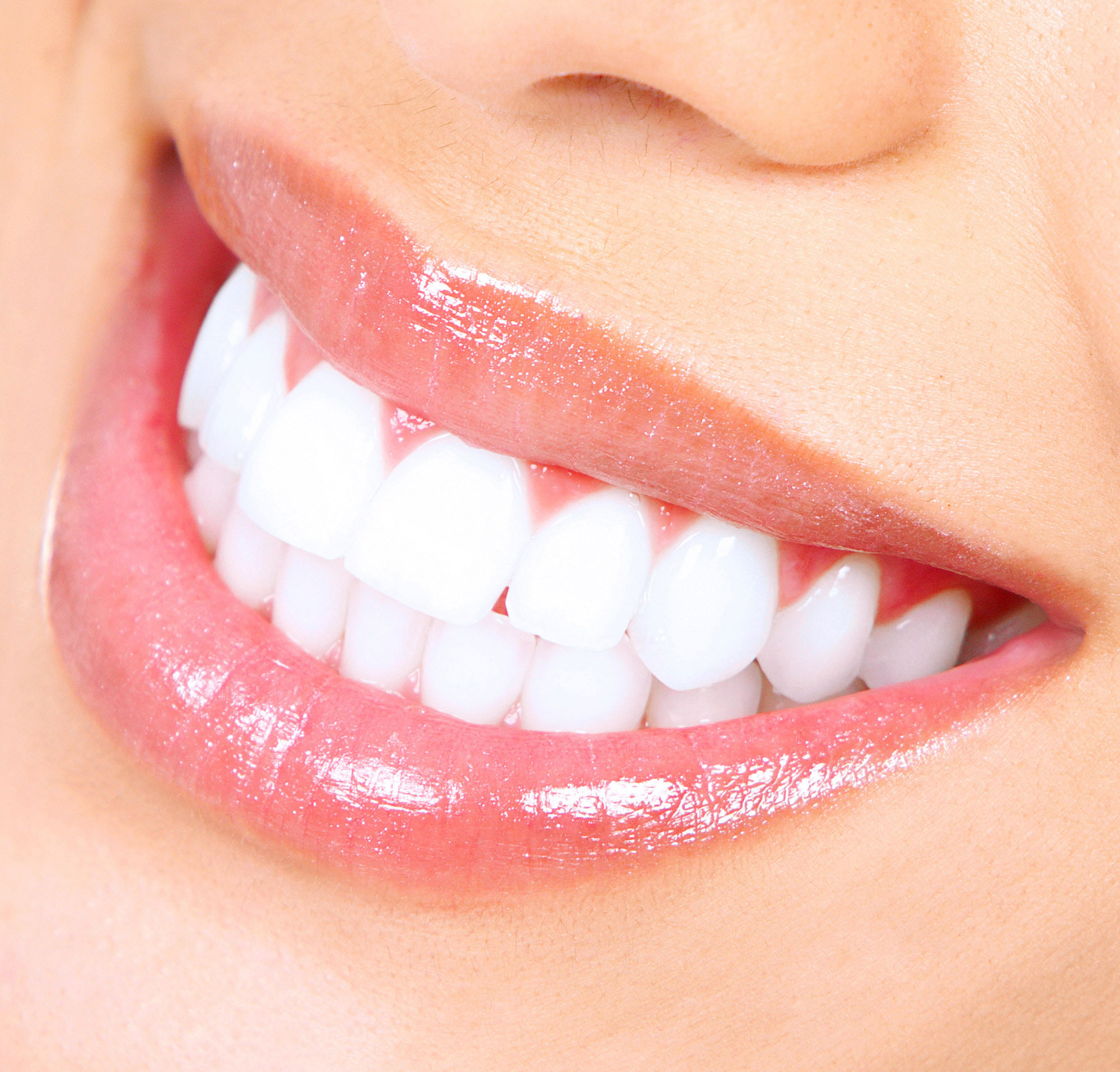 white teeth smiling with healthy gums